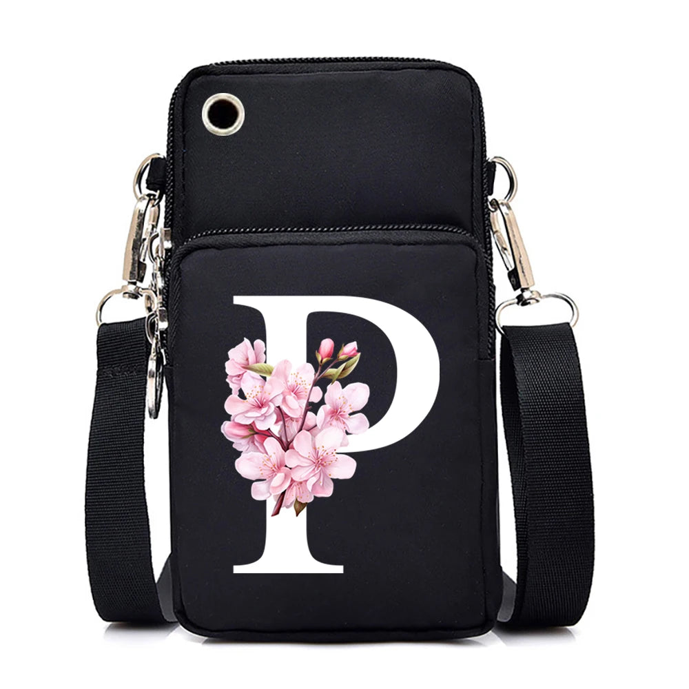 Small floral alphabet print crossbody bag for women, featuring colorful letters and a compact mobile phone purse design.