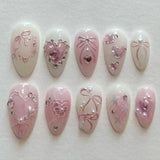 24-piece pink almond press-on false nails with bowknot, love heart, and pearl designs by HSF Marketplace