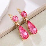 Bohemian vintage red teardrop earrings for women by HSF Marketplace, featuring ornate detail and dangling design