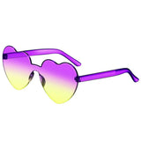 Pink heart-shaped sunglasses for women with a large vintage frame, UV400 protection, stylish outdoor eyewear by HSF Marketplace.