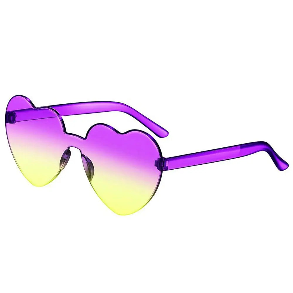 Pink heart-shaped sunglasses for women with a large vintage frame, UV400 protection, stylish outdoor eyewear by HSF Marketplace.