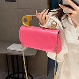 Red retro metal pin design crossbody bag for women, PU leather handbag with chain strap, stylish clutch and purse from HSF Marketplace.