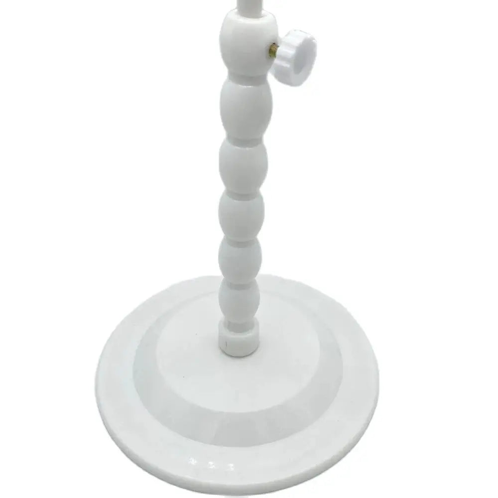 White plastic wig stand with mushroom top, portable and stable, ideal for short wigs and hair styling display.