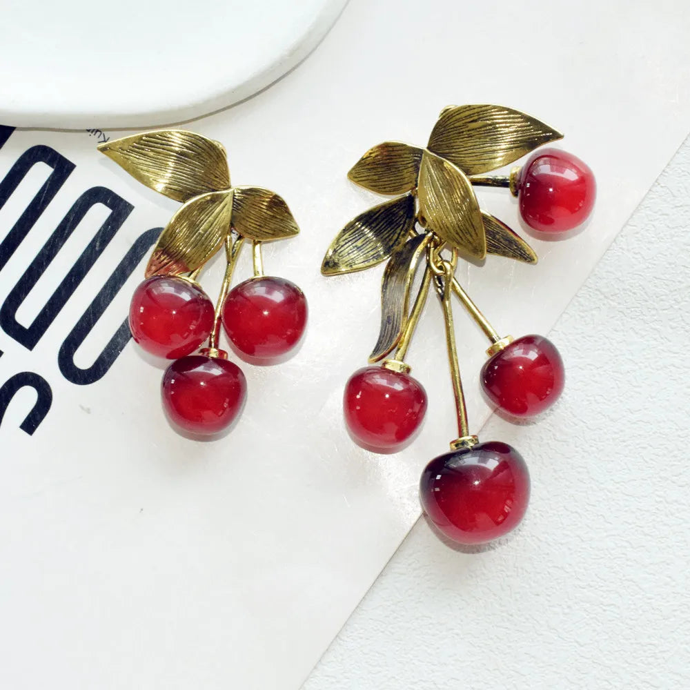 Vintage metal leaf and resin red cherry dangle earrings by HSF Marketplace