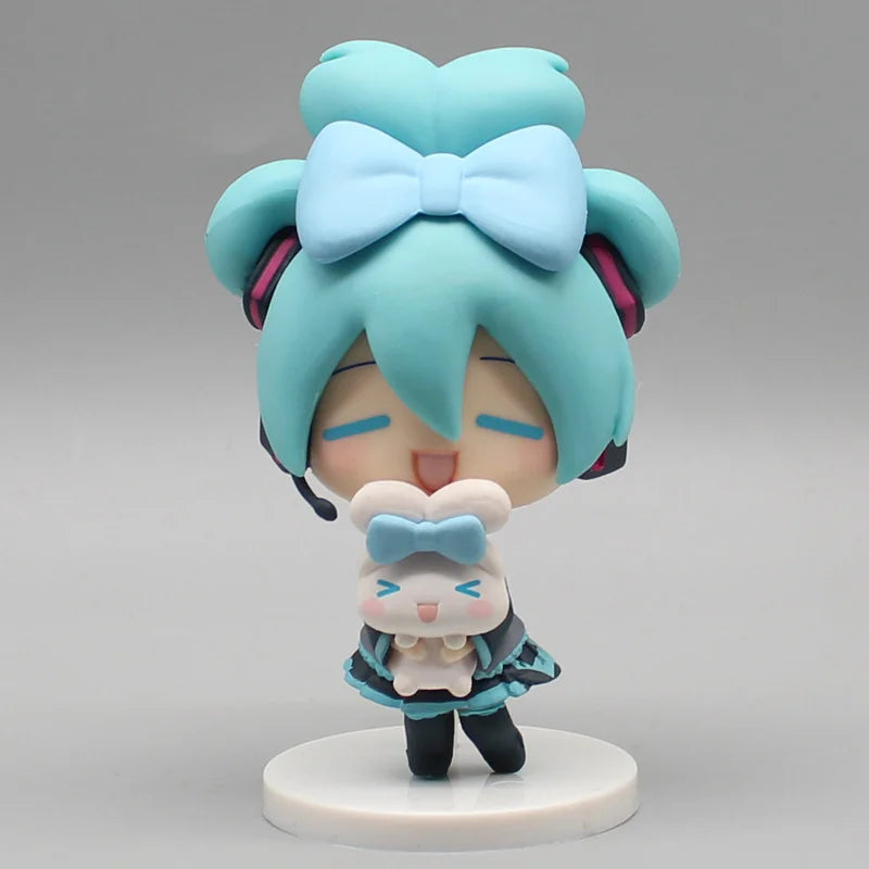 Hatsune Miku anime figurine holding a Cinnamoroll plush, kawaii tabletop collectible figure doll <|endoftext|>
