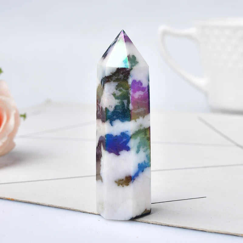 Natural black and white zebra quartz crystal obelisk with pointed tip, used for healing and home decor ornament.