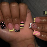 24-piece short square false nails with black and white zebra print, polka dots, and French-style tips