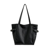 Black Rivet Design women's shoulder handbag with large capacity, elegant tote style, suitable for office and everyday use.