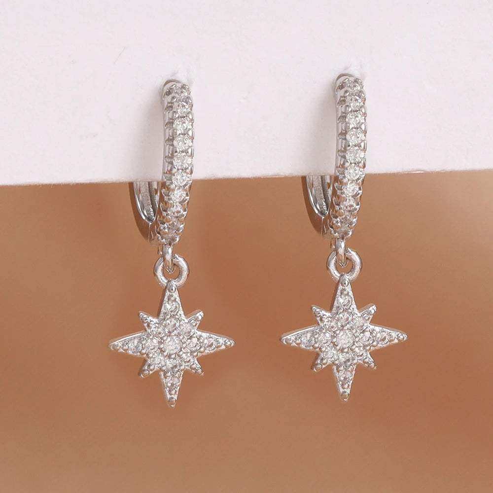 Stainless steel star dangle earrings with sparkling zircons by HSF Marketplace