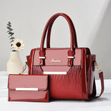 High-quality PU leather women's messenger bag with shoulder strap, luxury designer purse, crossbody style, in black.