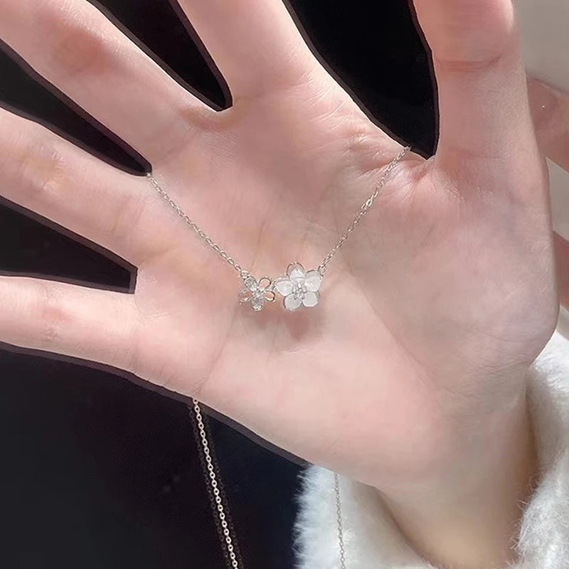 Elegant zircon cherry blossom necklace for women, featuring a delicate floral design, perfect for fashion and party jewelry.