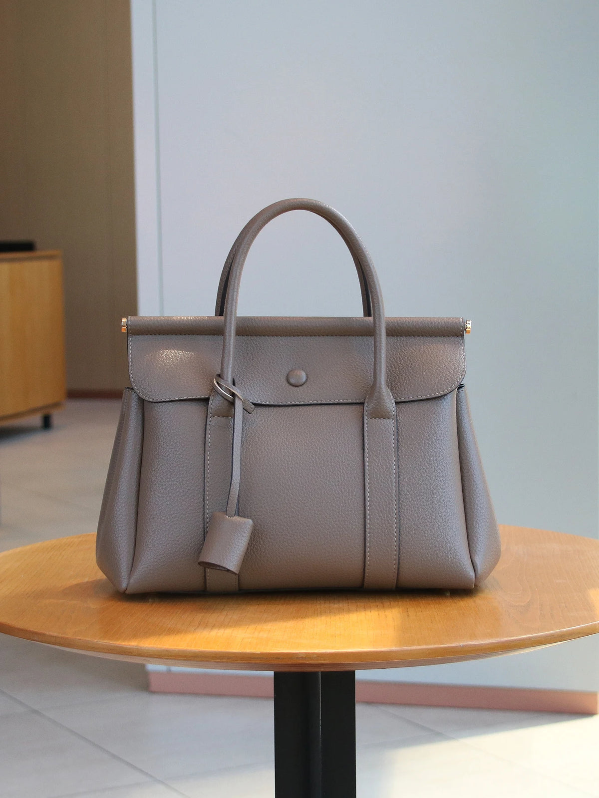 Vintage style women's handbag by HSF Marketplace featuring a soft leather flap messenger bag for office and commute use.