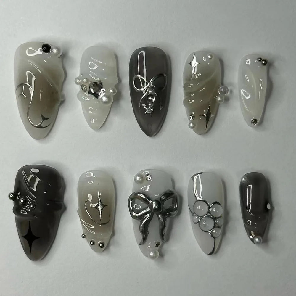Pink almond false nails with bowknots, love hearts, and pearl designs, 24-piece detachable Korean press-on nail set