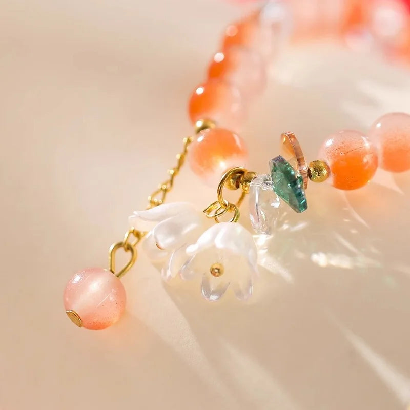 Colorful Lily Valley flower bracelet with crystal beads and elastic band, perfect for women’s fashion, weddings, and birthdays.