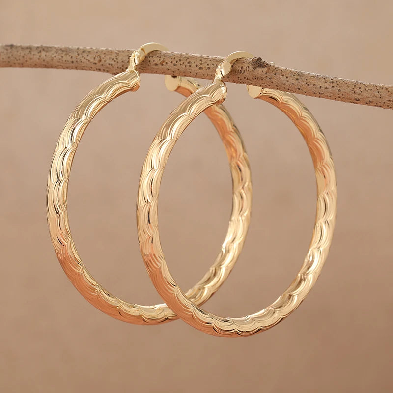 Classic metal hoop earrings with carved pattern for women by HSF Marketplace