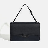 Luxury genuine leather shoulder bag for women in winter fashion style, with structured design and adjustable strap