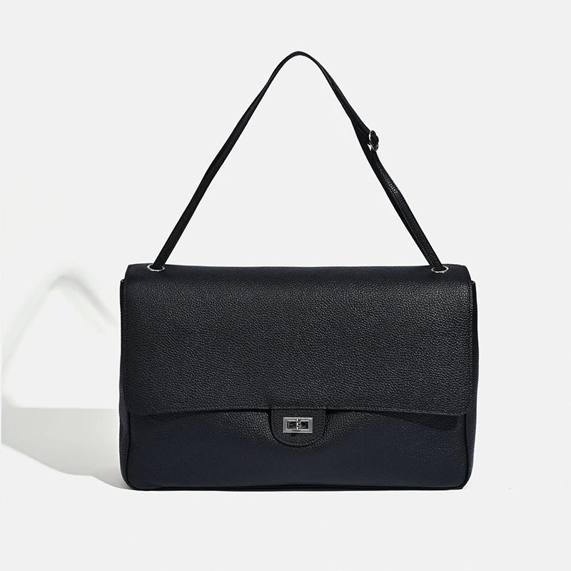 Luxury genuine leather shoulder bag for women in winter fashion style, with structured design and adjustable strap