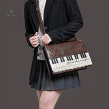 Vintage piano shoulder bag for women, stylish black crossbody ita bag with piano key design