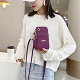 Women’s crossbody mobile phone bag from HSF Marketplace featuring a 3-layer design, coin pocket, and shoulder strap.