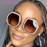 Trendy oversized oval frame women's sunglasses by HSF Marketplace, stylish UV400 eyewear for summer travel and fashion.