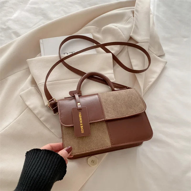 Elegant women's handbag by HSF Marketplace featuring a geometric pattern, crossbody strap, snap closure, perfect for everyday use.