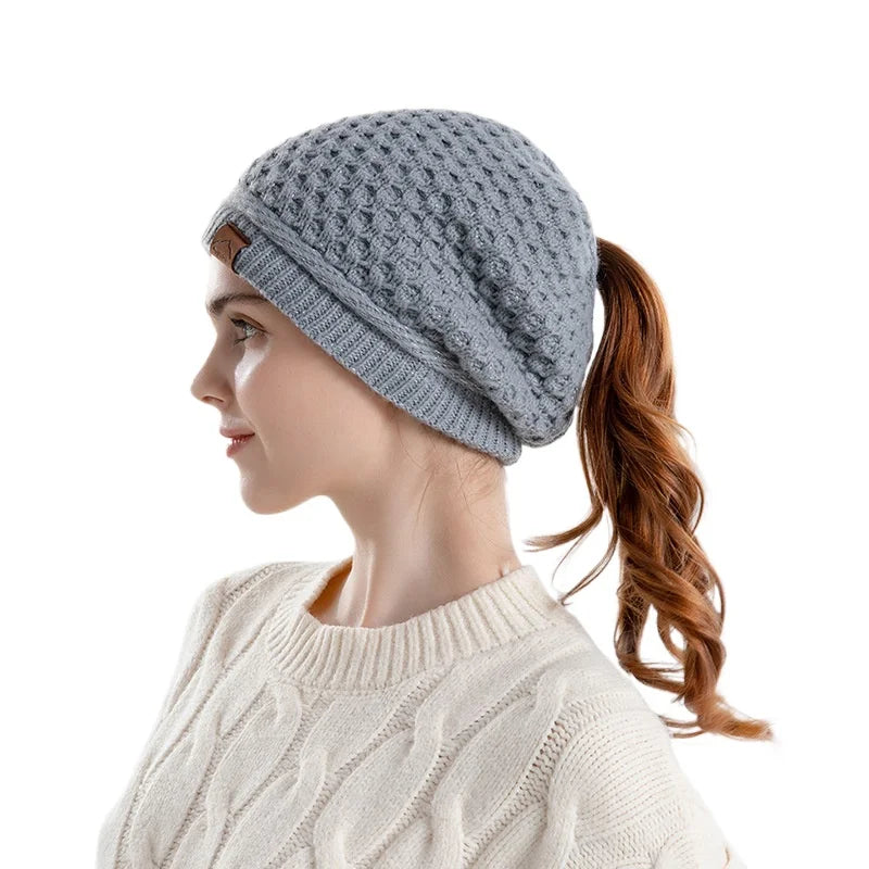 Women's HSF Marketplace fleece-lined beanie with ponytail hole and ear flaps, slouchy winter hat