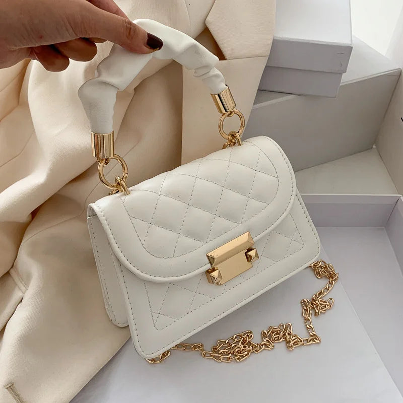 Luxury black PU leather shoulder handbag for women, stylish small clutch with underarm design, ideal for elegant occasions.