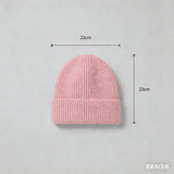 Warm knitted melon hat winter beanie for women, soft textured design in a cozy style