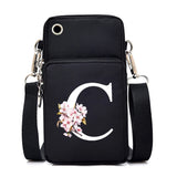 Fashion floral letter crossbody bag for women with Sakura alphabet graphics, mobile phone compartment, and stylish purse design.