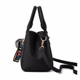 Leather embroidery messenger bag for women, stylish handbag with hairball design, versatile purse for daily use.
