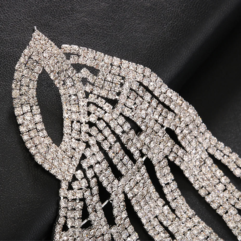 Oversized rhinestone wing drop earrings for women, featuring sparkling crystal-studded wing designs