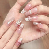 24-piece cute girly short square false nails with white French tips, glitter stars, rhinestones, cat eye, and bows