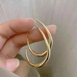 Geometric oval hoop earrings for women, simple fashion jewelry for parties and weddings