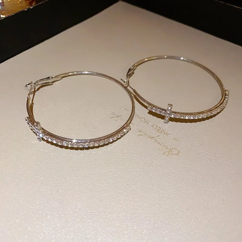 Shiny geometric cross hoop earrings with rhinestones for women, high-end statement jewelry by HSF Marketplace