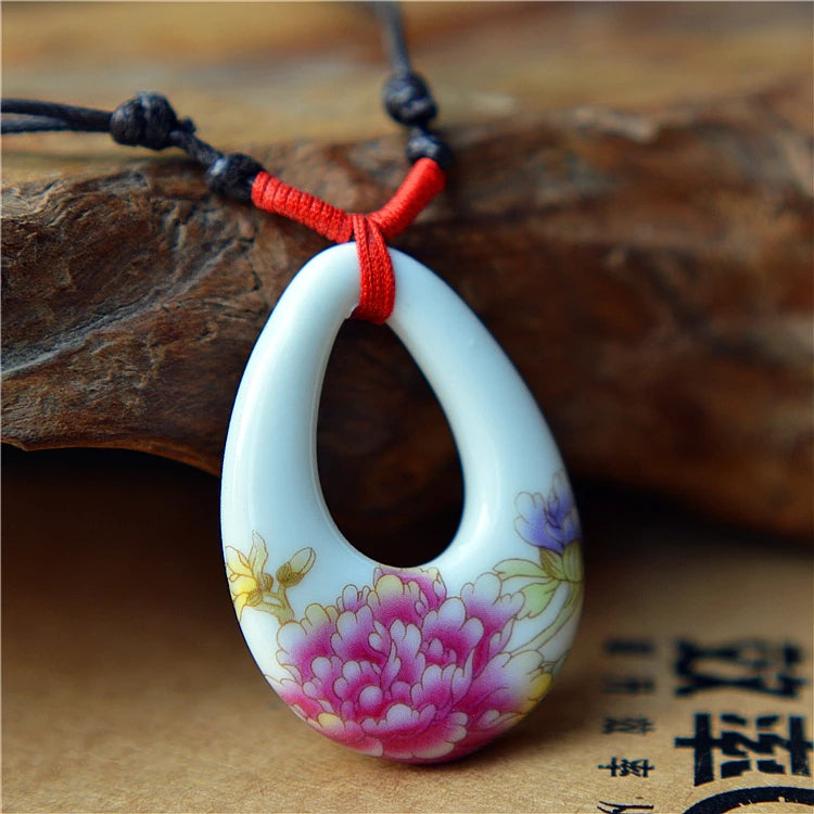 Women's ceramic fashion necklace and pendant jewelry by HSF Marketplace, featuring elegant drop design for women.