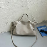Luxury PU leather women's handbag with spacious design, shoulder and crossbody styles, perfect for commuting and office use.
