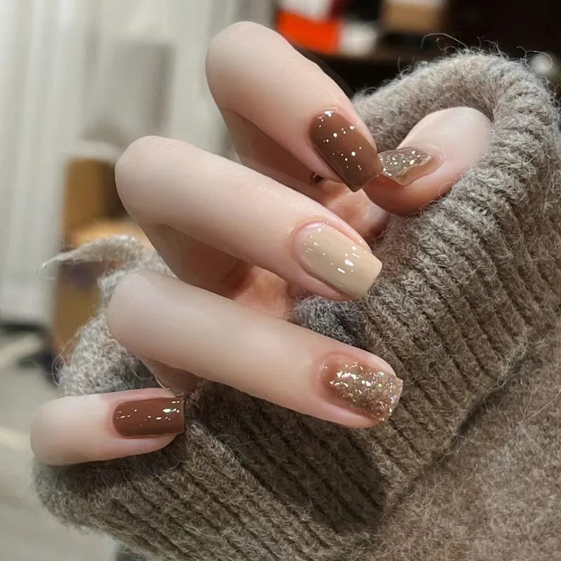 24-piece cute girly short square false nails with white French tips, glitter stars, rhinestones, cat eye, and bows