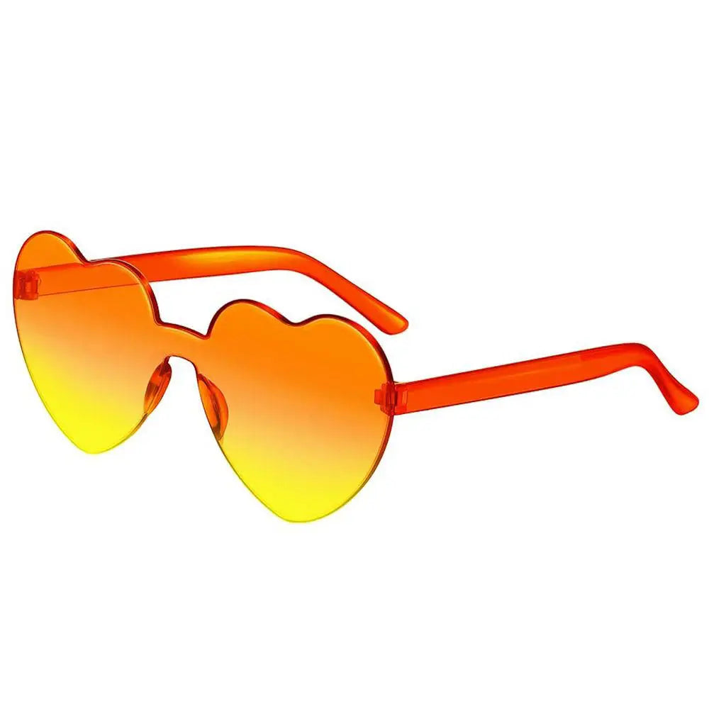 Pink love heart-shaped sunglasses for women with big frames, vintage style, UV400 protection, outdoor fashion eyewear from HSF Marketplace.