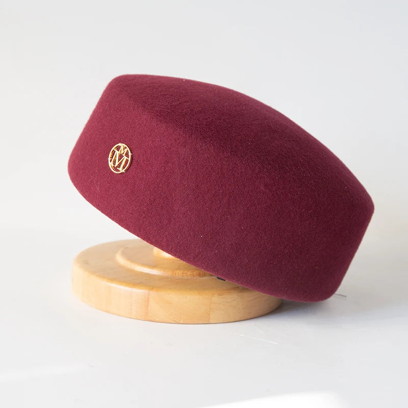 Women's vintage wool felt beret hat with hard concave top, pillbox fascinator style for weddings and cocktail parties