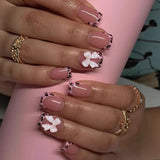 24-piece nude pink short duckbill false nails with leopard French tips, 3D bowknots, butterflies and cherries