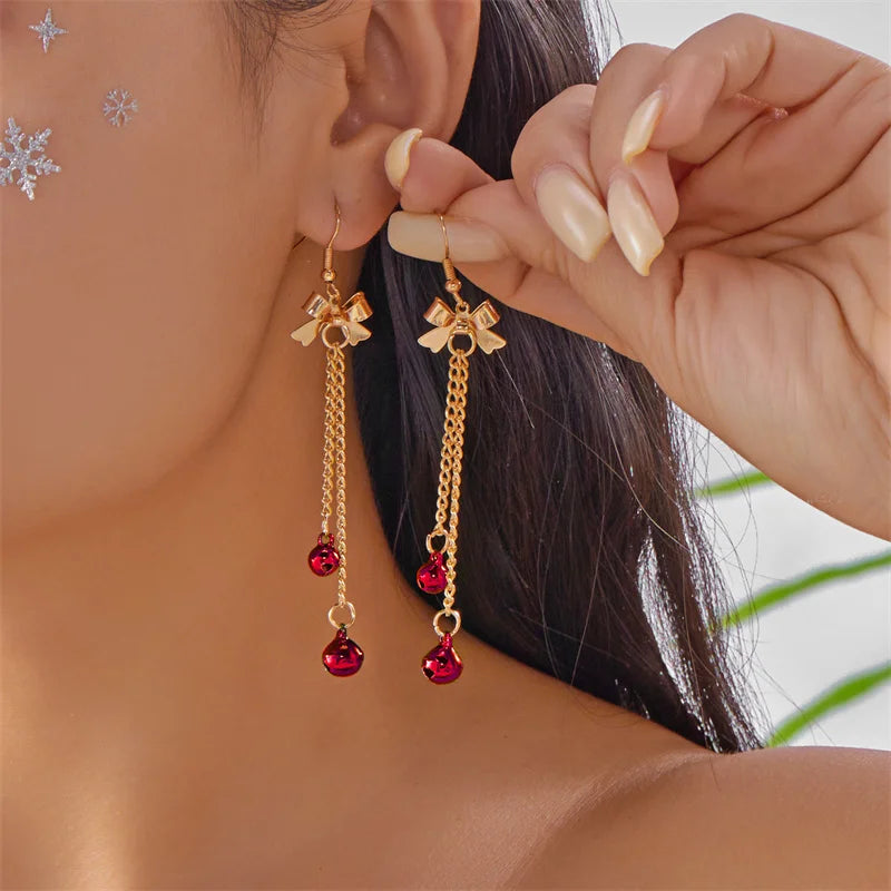 Trendy Christmas asymmetrical dangle earrings for women by HSF Marketplace, festive holiday jewelry.