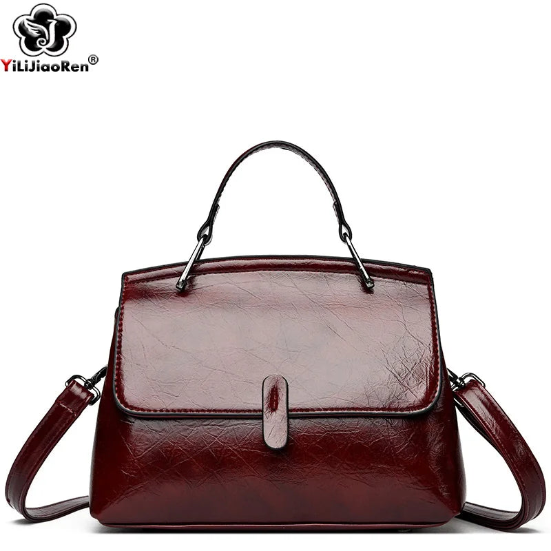 Elegant women's leather handbag from HSF Marketplace featuring a small shoulder bag design with a crossbody strap and stylish details.
