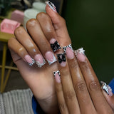 24-piece nude pink short duckbill false nails with leopard French tips, 3D bowknots, butterflies and cherries