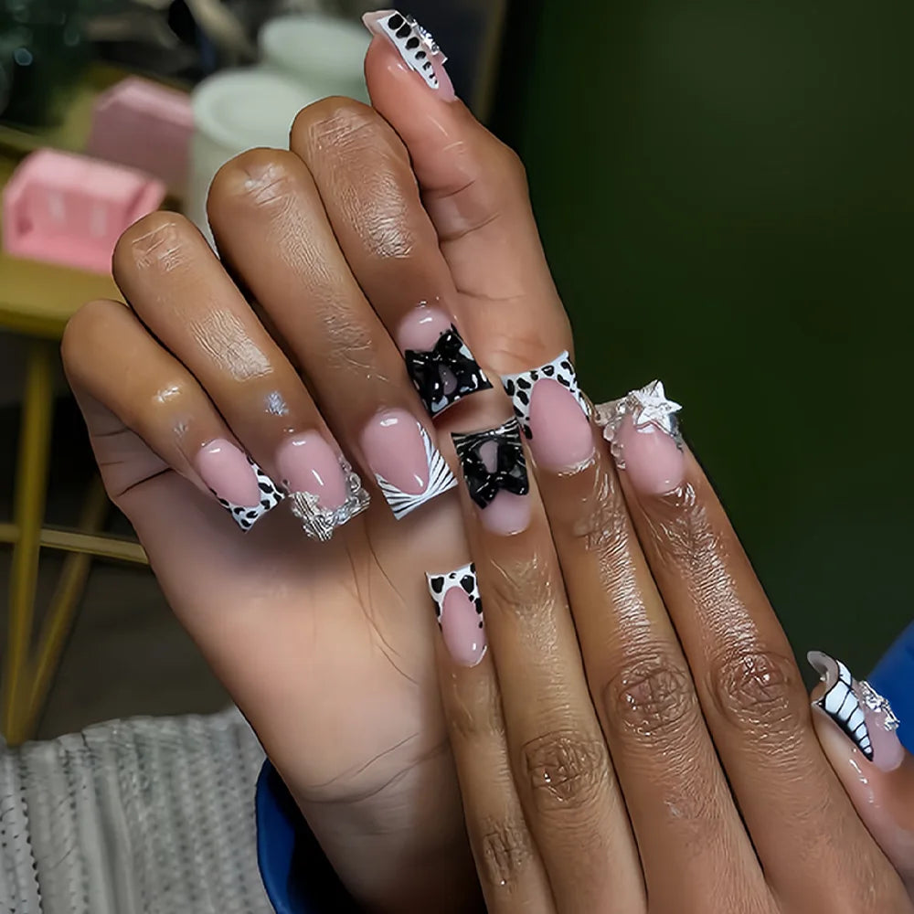 24-piece nude pink short duckbill false nails with leopard French tips, 3D bowknots, butterflies and cherries