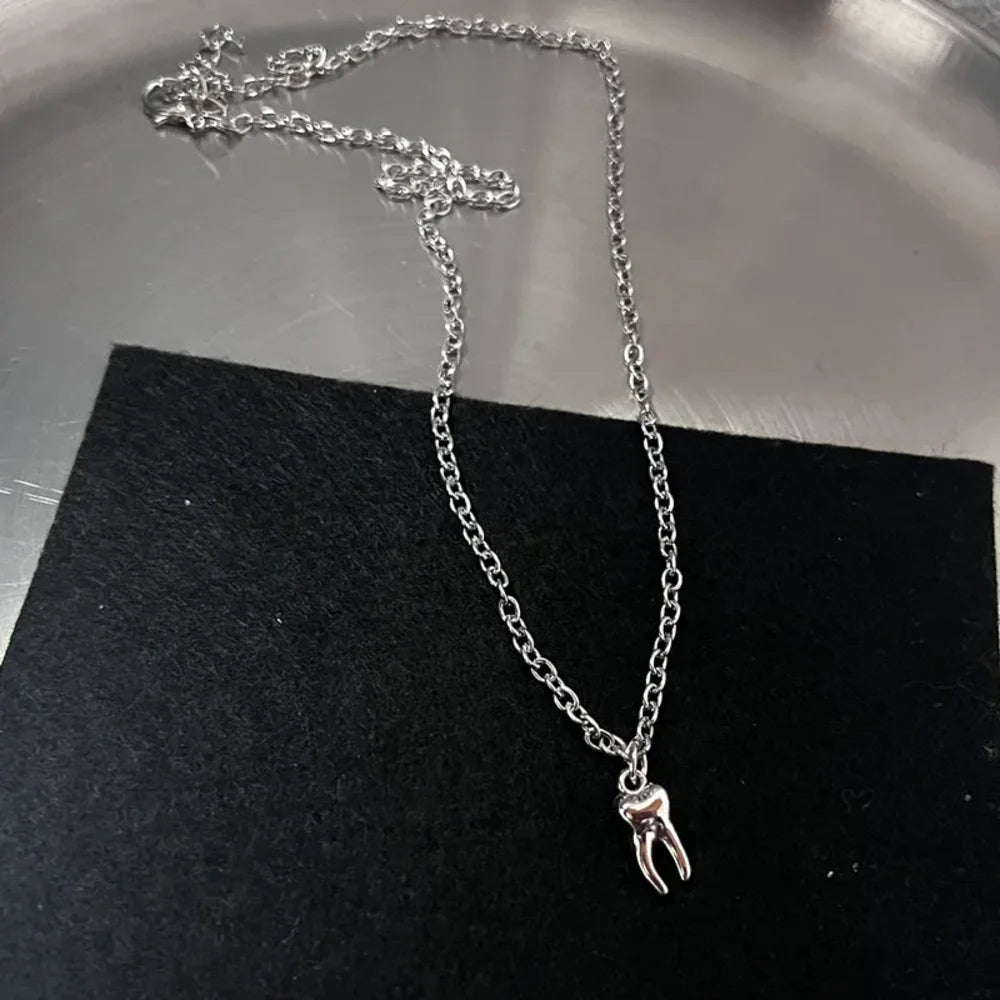 Stainless steel music note heart necklace featuring treble and bass clef charms, infinity love pendant for women jewelry.