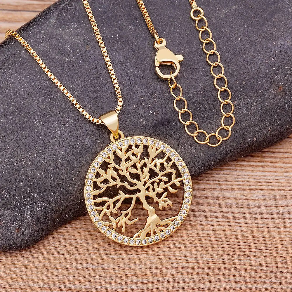 Gold plated Tree of Life pendant necklace with crystal accents, elegant jewelry for women featuring zircon chain and detailed design