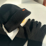 100% pure cashmere winter set with hat, scarf, and gloves in a soft neutral color palette