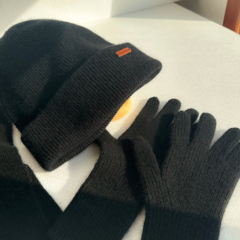 100% pure cashmere winter set with hat, scarf, and gloves in a soft neutral color palette