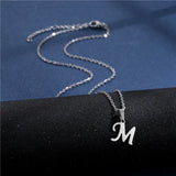 Shiny stainless steel initial letter pendant necklace for women featuring a simple clavicle chain choker jewelry style.