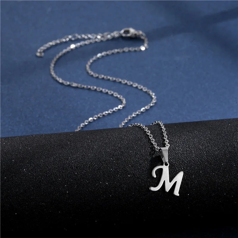 Shiny stainless steel initial letter pendant necklace for women featuring a simple clavicle chain choker jewelry style.